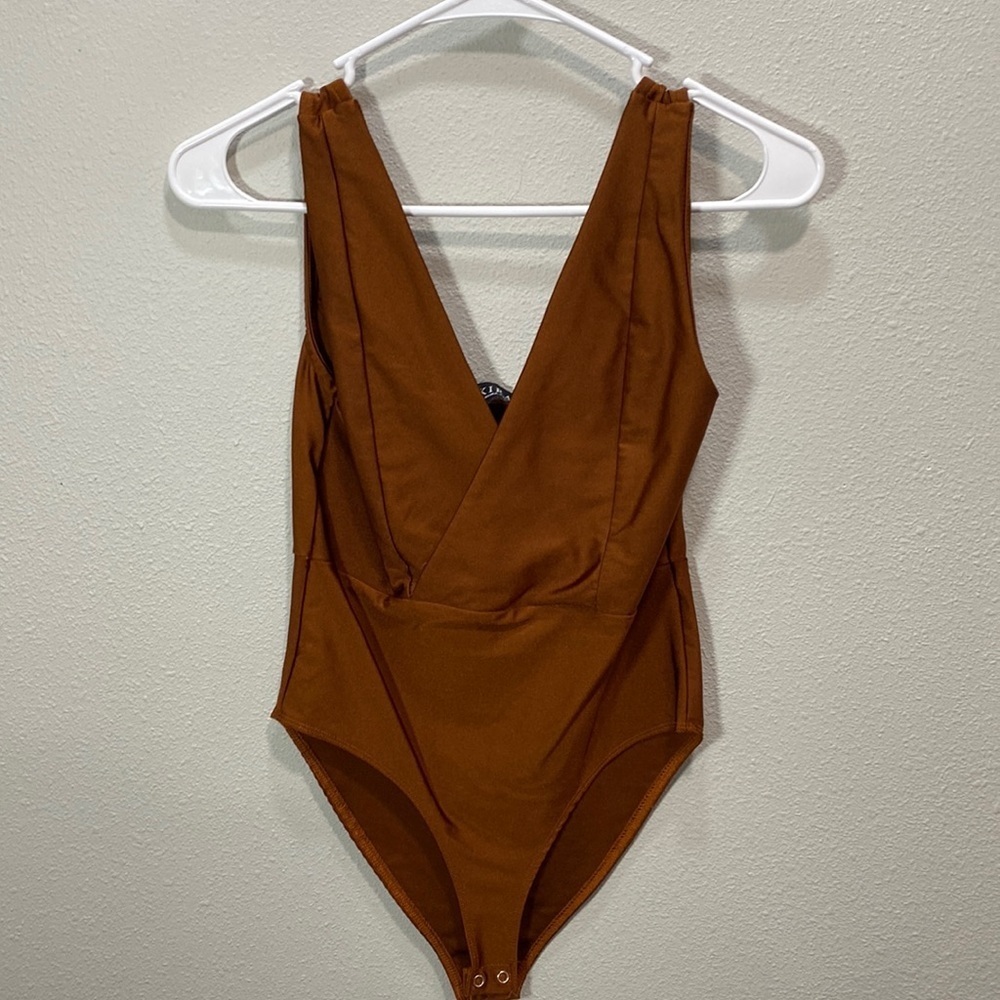 Akira‎ bodysuit rust orange color